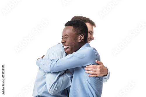 Fototapeta business men happy embracing