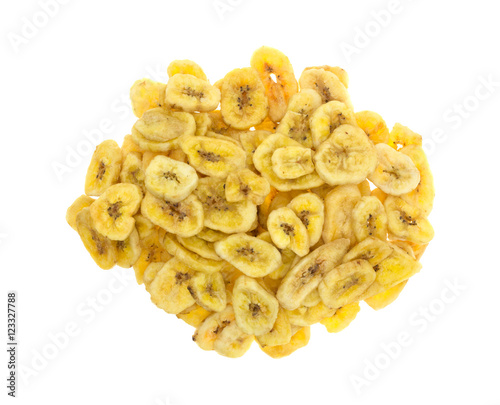 Dried bananas on a white background top view.