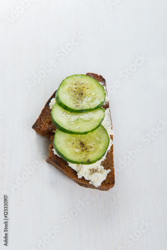 Single sandwich with cream cheese and cucumber