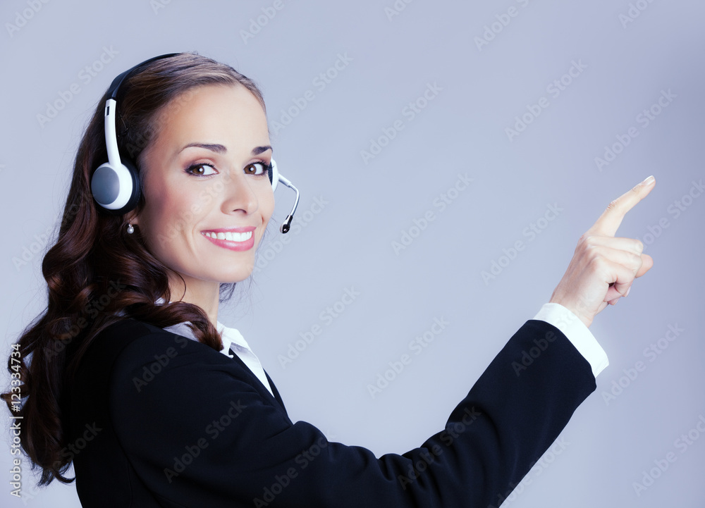 Support phone operator pointing, over grey Support phone operator pointing, over grey
