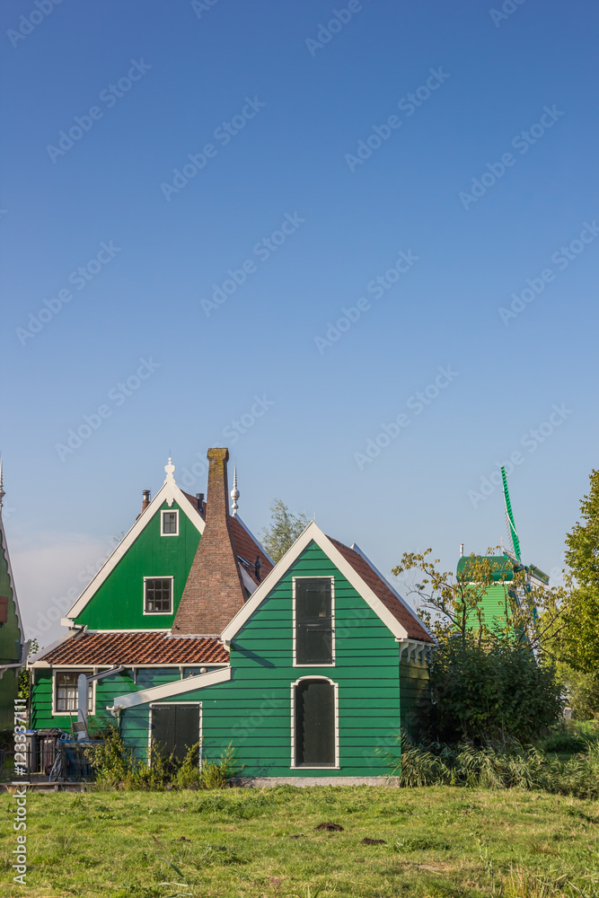 Typical dutch wooden houses in Zaanse Schans Typical dutch wooden houses in Zaanse Schans