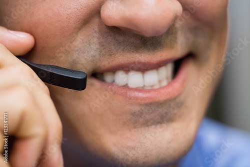 Technician talking on head phones