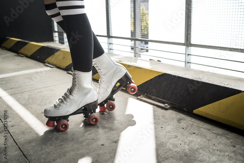 Vintage roller skaters in sunlight photo