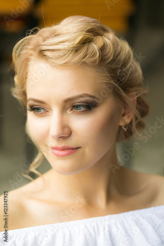 Pretty girl with elegant hairstyle