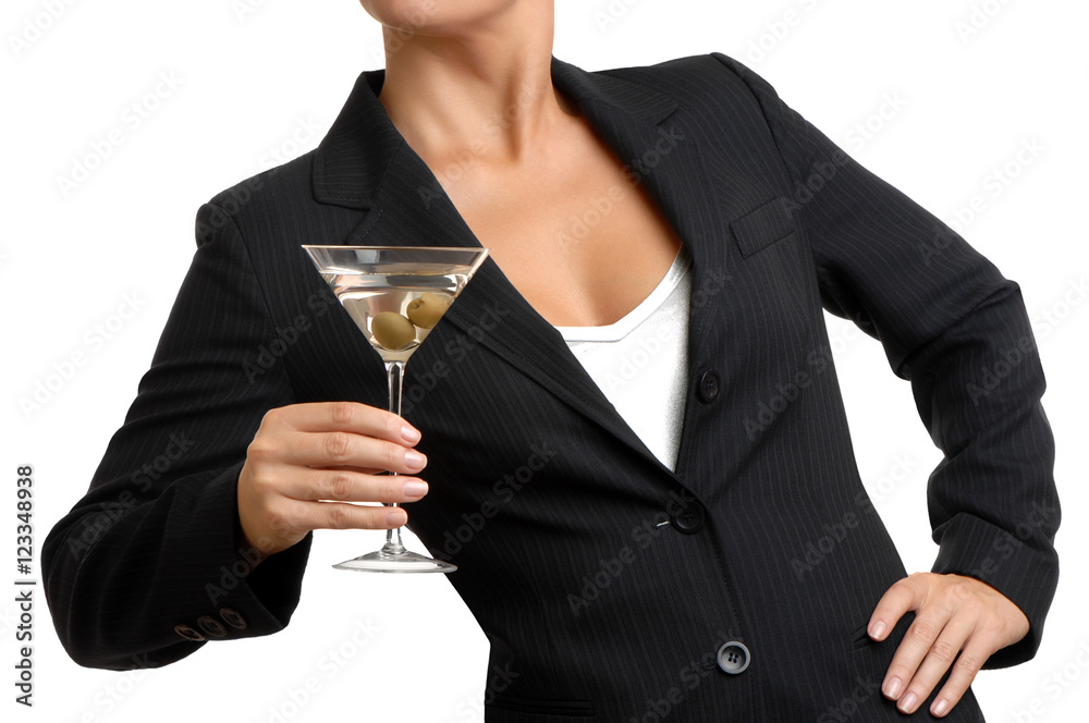 A businesswoman holding a martini A businesswoman holding a martini