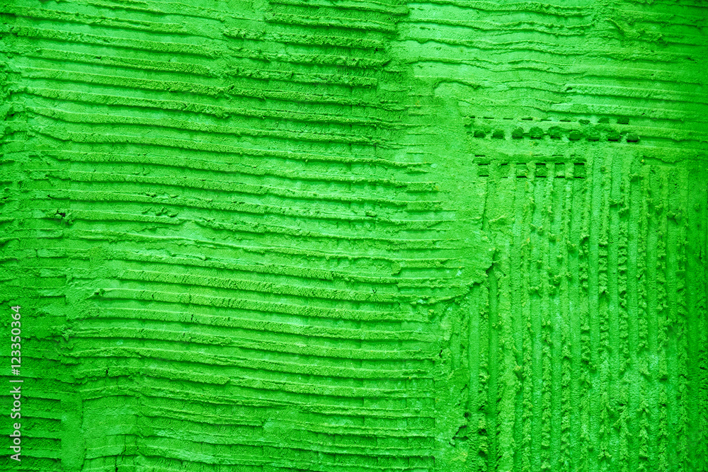 Green textured cement wall