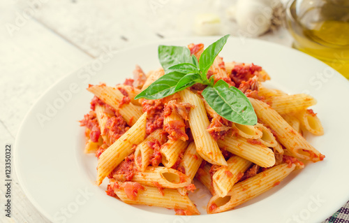 Penne pasta with tuna and basil
