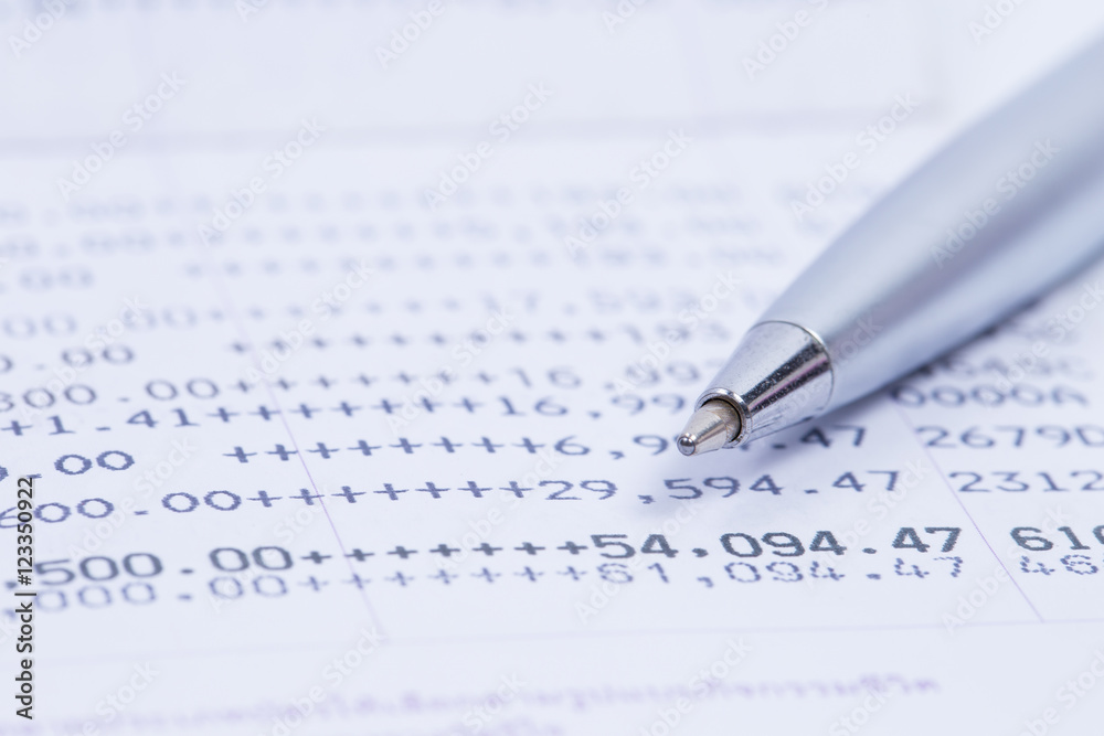 Finance Concepts, pen with passbook as background Finance Concepts, pen with passbook as background