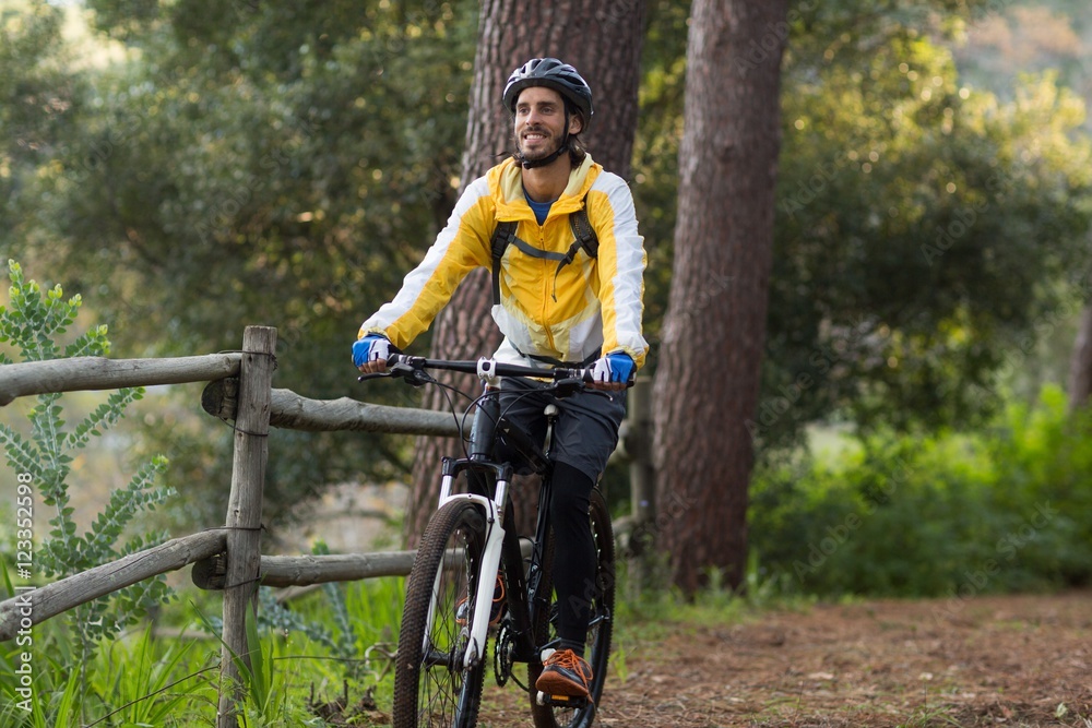 Fototapeta premium Male biker cycling in countryside