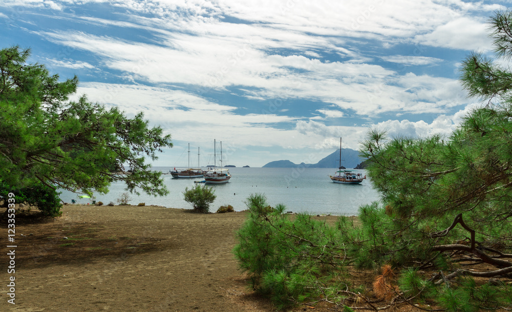 ships in the harbor of the ancient city of Phaselis