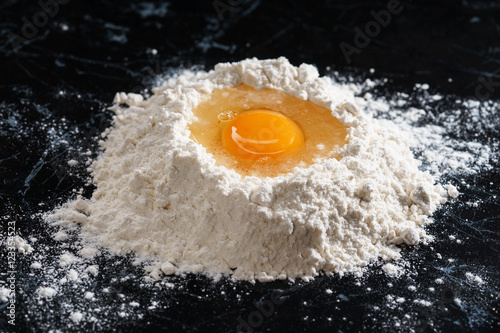 Baking background with egg and flour
