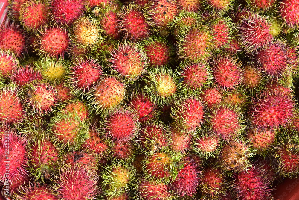 Tropical fruit, rambutan in the fruit market in southeast Asia. Tropical fruit, rambutan in the fruit market in southeast Asia.