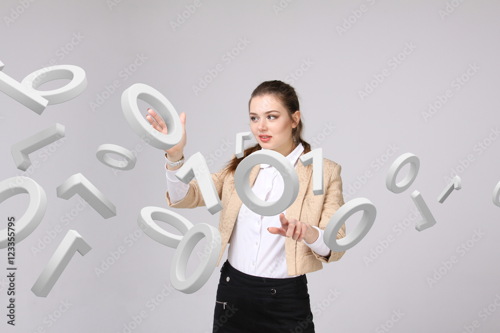 Woman working with binary code, concept of digital technology. Woman working with binary code, concept of digital technology.