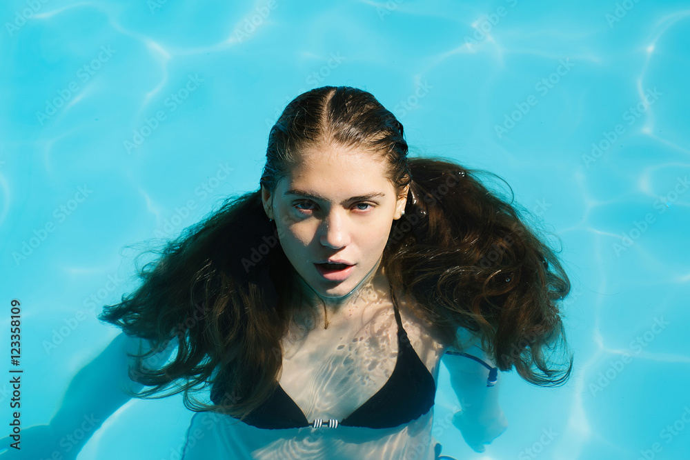 sexy woman in swimming pool