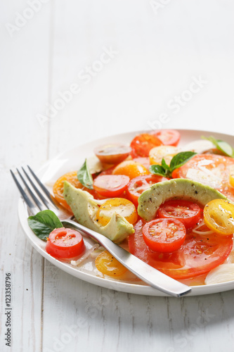 Tomato, avocado and red onion salad