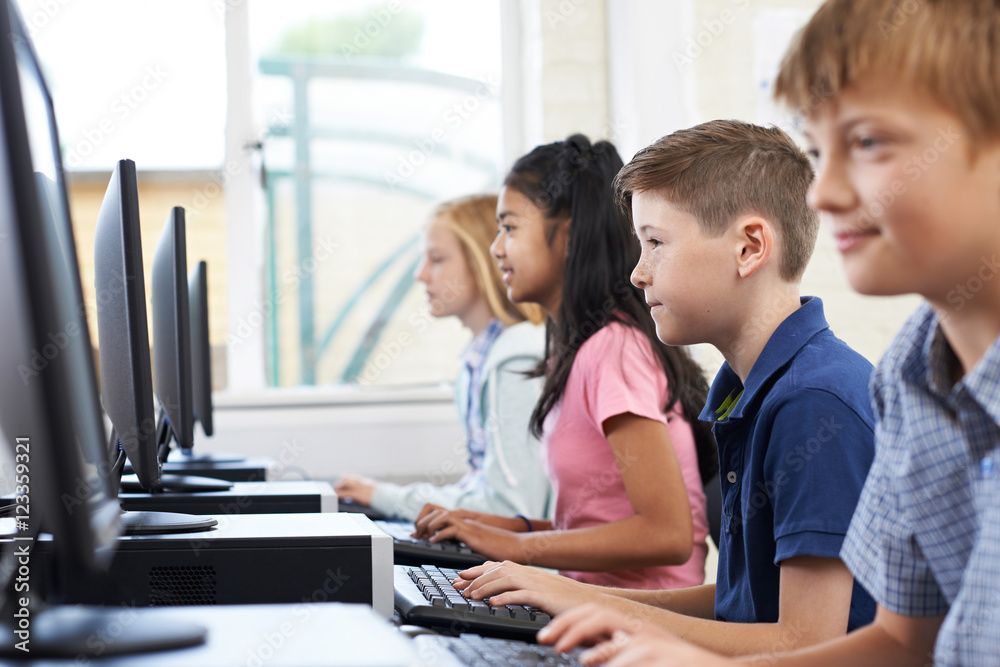 Male Elementary Pupil In Computer Class Male Elementary Pupil In Computer Class