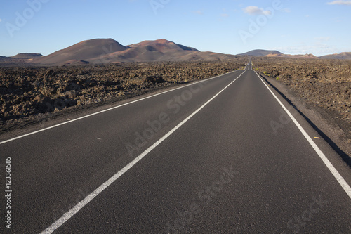 Road through volcanic terrain on the Lanzarote, Canary Islands