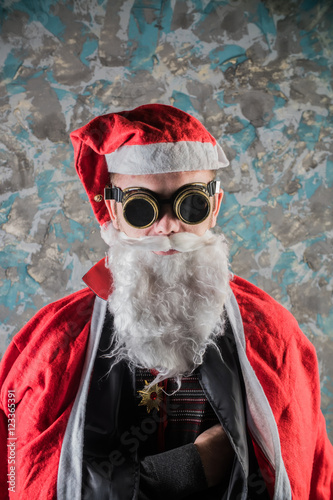 portrait of Santa Claus, a young man dressed in a stimpack hipster style