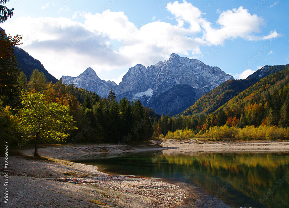 Jasna Lake near Kranjska Gora in Slovenia, looking resplendent in autumn colours.