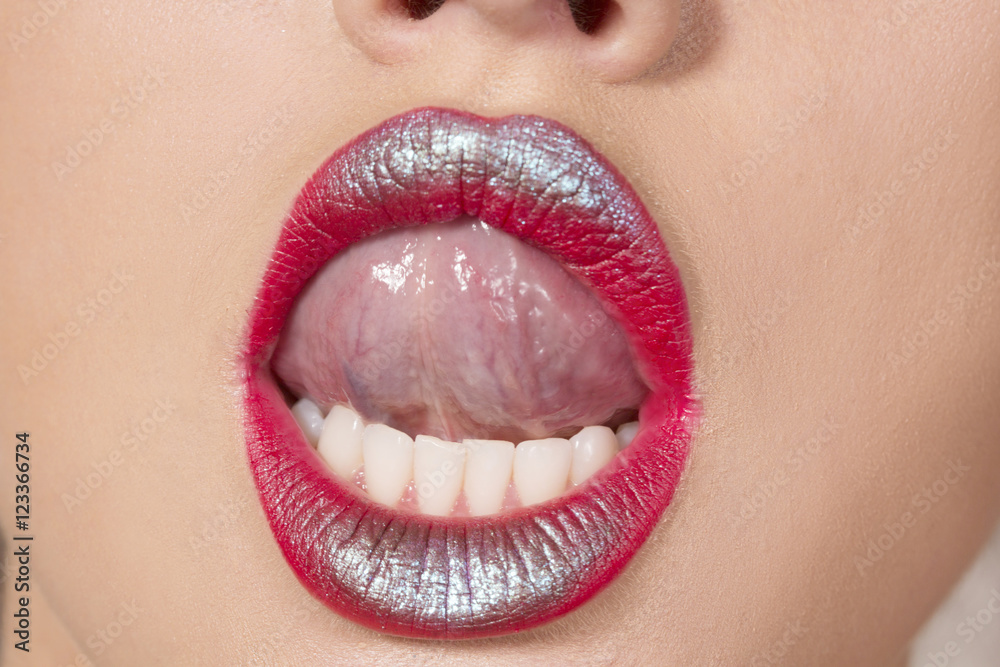 Foto Stock Licking her lips | Adobe Stock