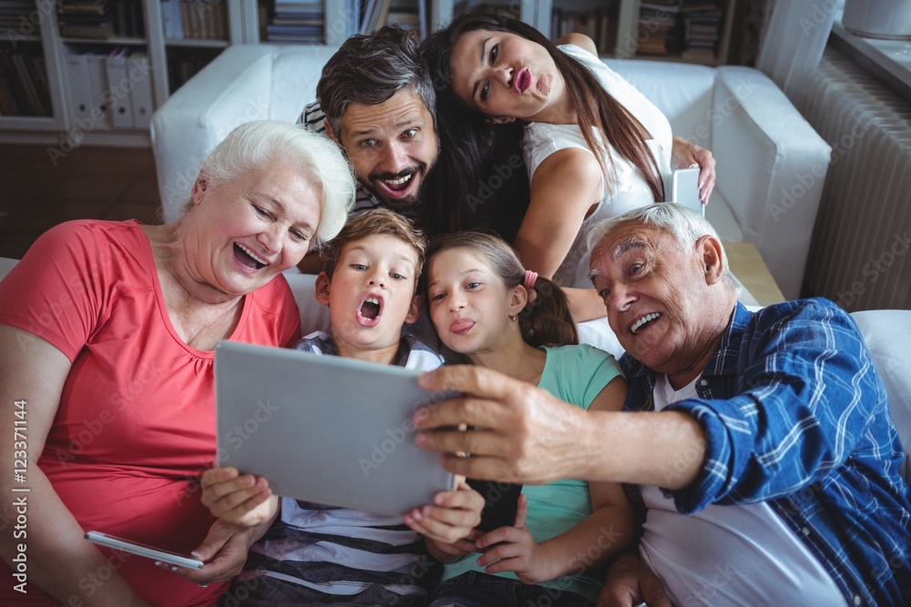 Multi-generation family taking a selfie Multi-generation family taking a selfie