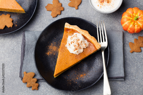 Konstfotografi Pumpkin pie, tart with whipped cream on a plate