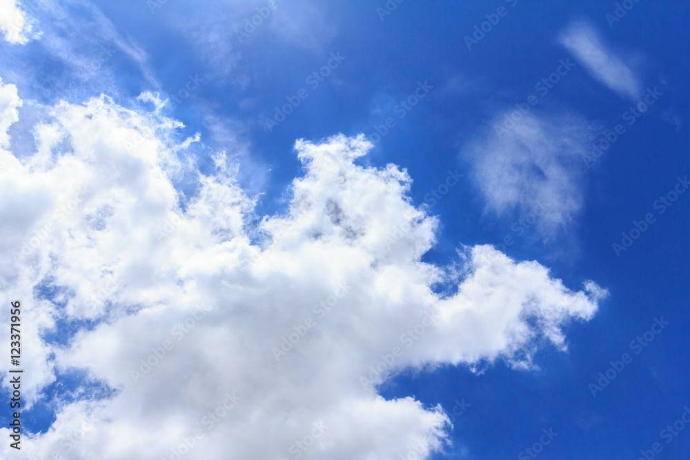 Fototapeta premium Blue sky background with white clouds. The vast blue sky and clouds sky on sunny day. White fluffy clouds in the blue sky.