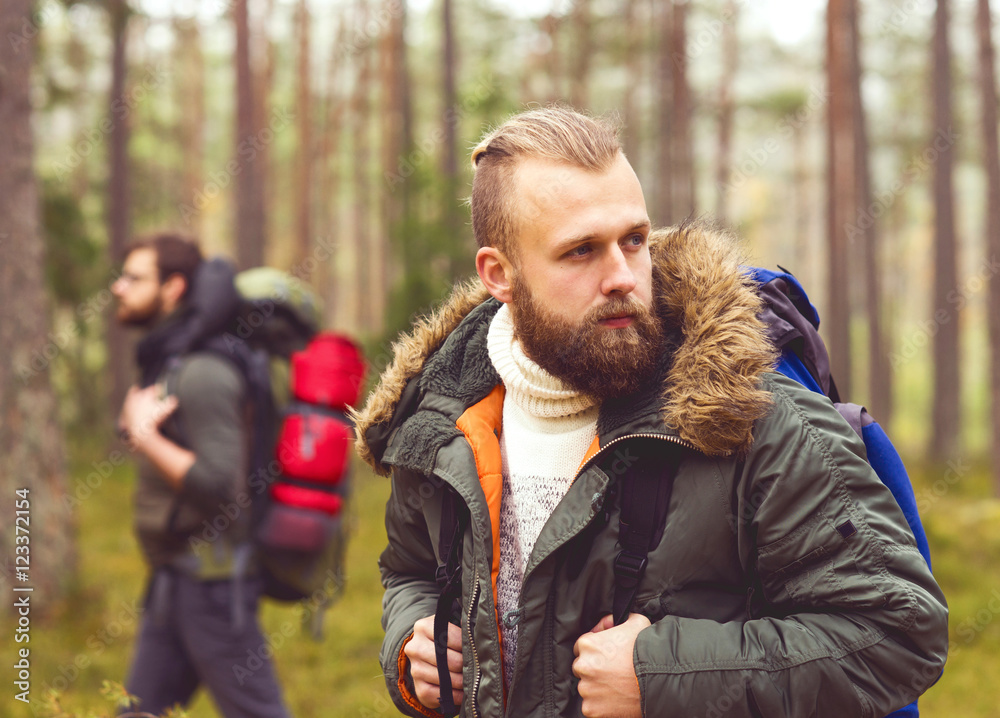 Camp, adventure, traveling and friendship concept Camp, adventure, traveling and friendship concept