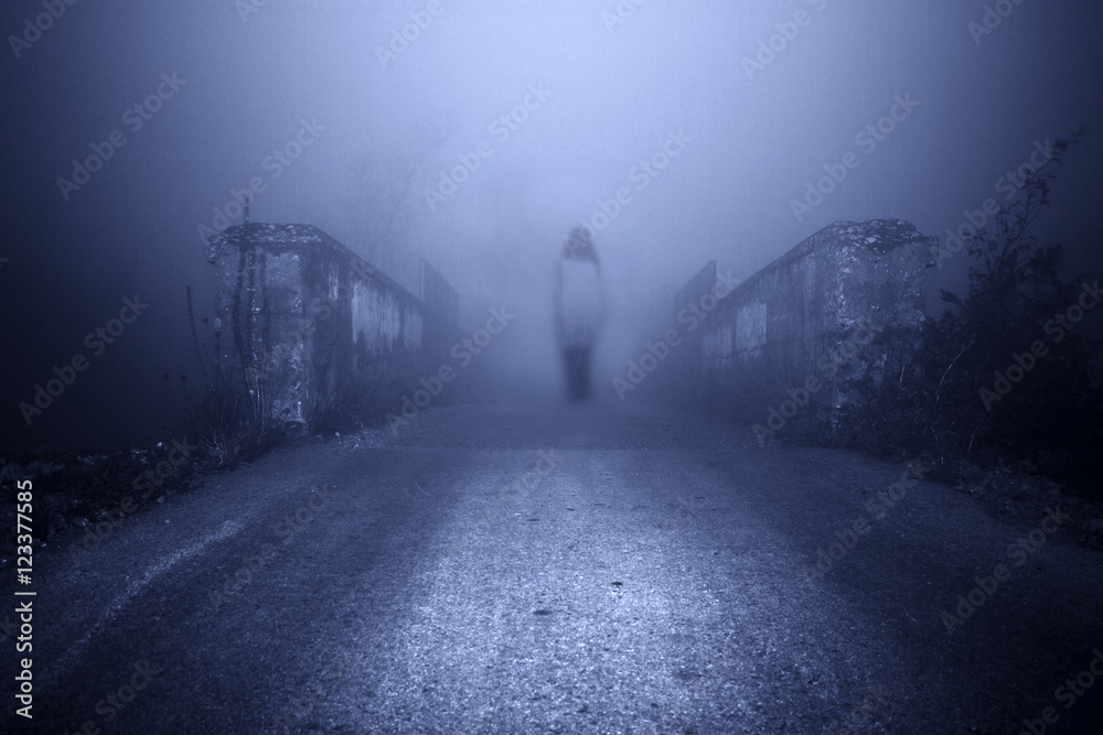 Horror female ghost in the mist