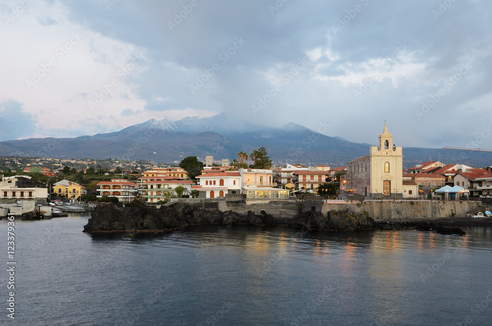 Active volcano Etna above the Italian town