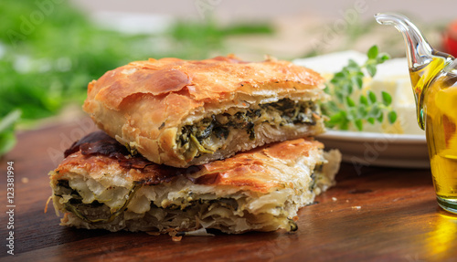 Spinach pie pieces on a table