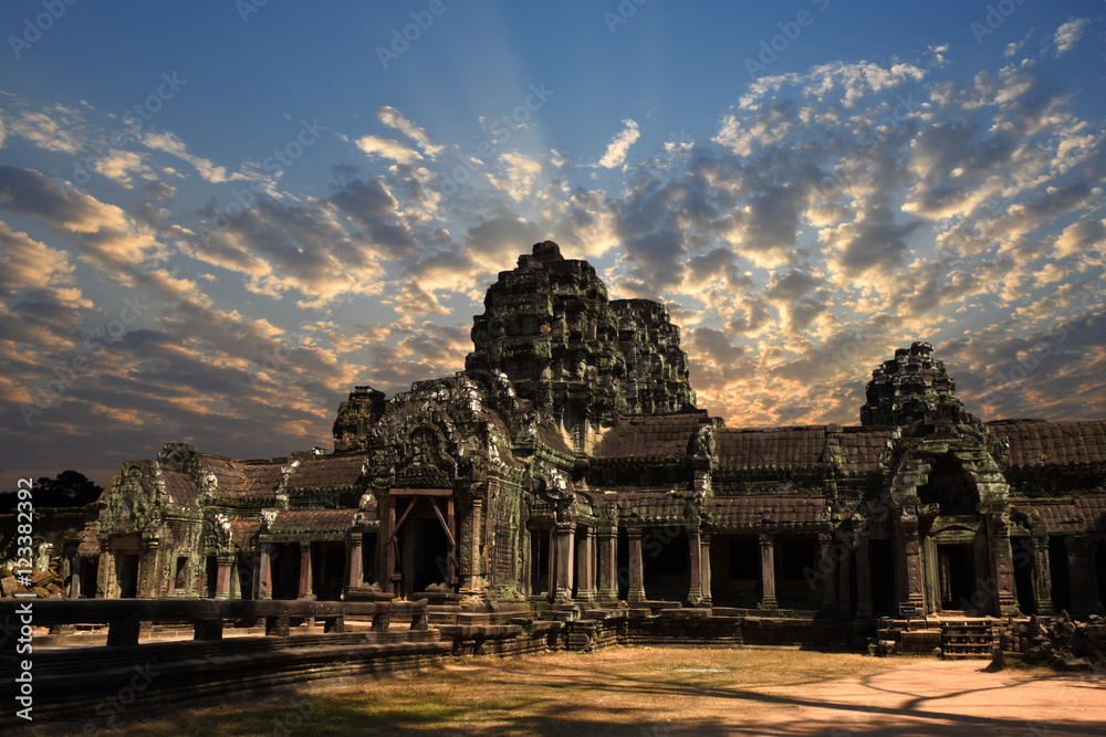 Fototapeta premium ancient Bayon Temple at Angkor Wat during sunrise, Siem Reap, Cambodia