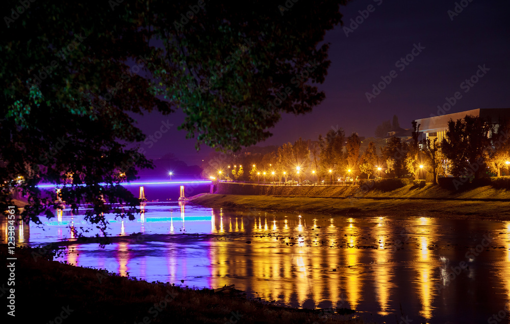 reflection in the water of illumination the bridge reflection in the water of illumination the bridge