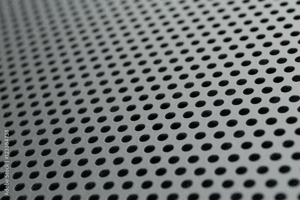 Metallic background with round holes Metallic background with round holes