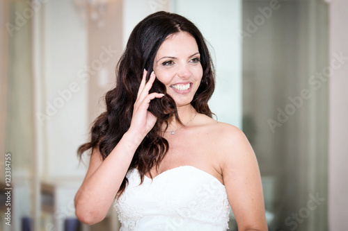 girl smiling with the wedding dress