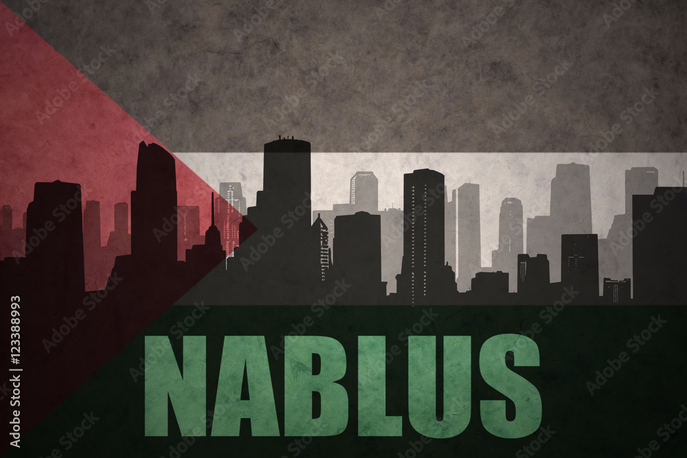 abstract silhouette of the city with text Nablus at the vintage palestinian flag background