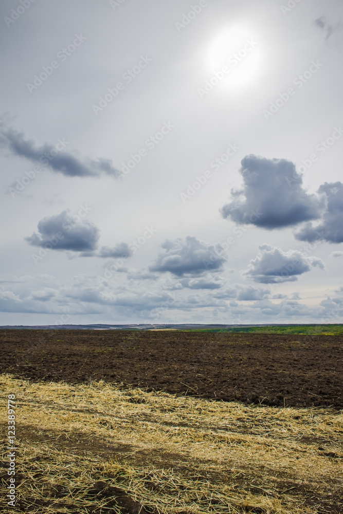 plowed field in gloomy day, nature background plowed field in gloomy day, nature background