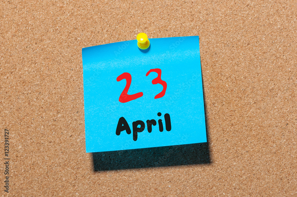 April 23rd. Day 23 of month, calendar on cork notice board, business background. Spring time, empty space for text April 23rd. Day 23 of month, calendar on cork notice board, business background. Spring time, empty space for text