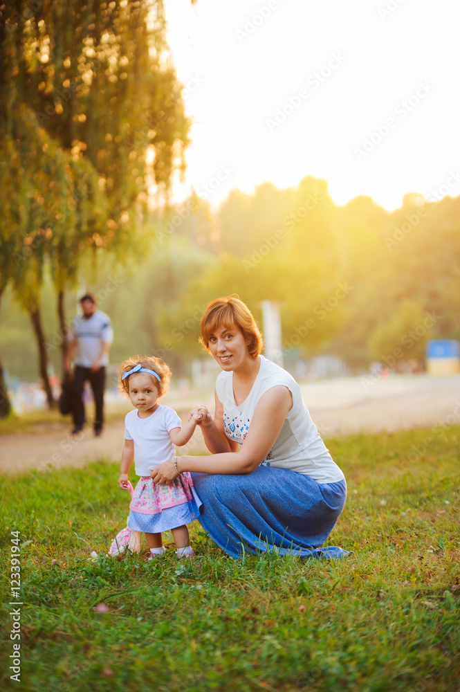 Fototapeta premium Mother and daughter in park