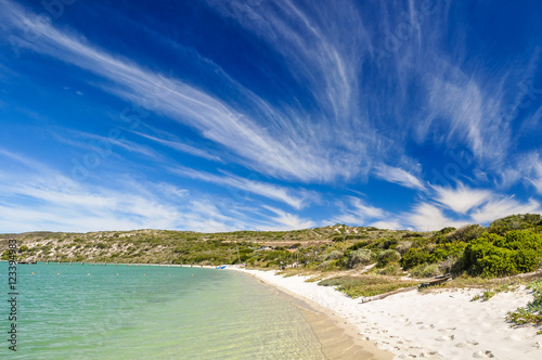 Stunning view of Langebaan Lagoon in West Coast National Park,120 km north of Cape Town, Western Cape Province, South Africa. Sunny day, white beach and mountains in the background.  photo