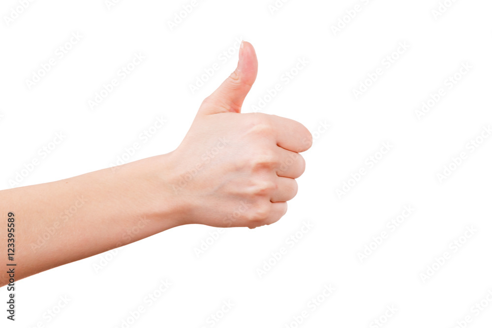 Female hand gesturing thumb up