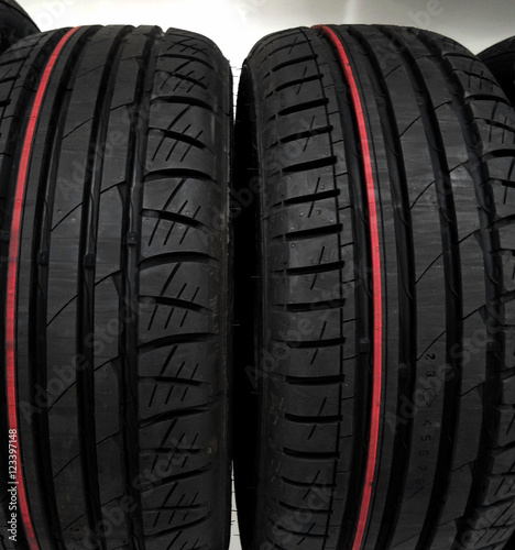 New non studded winter tires shows on the showcase of tire shop  © AnyVIDStudio