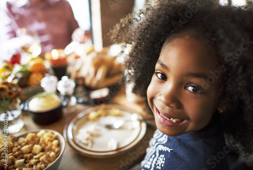 Little Girl Eating Thanksgiving Celebration Concept