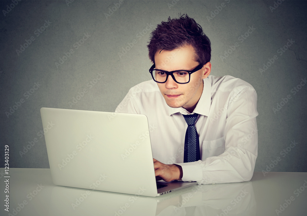 Man using his laptop computer