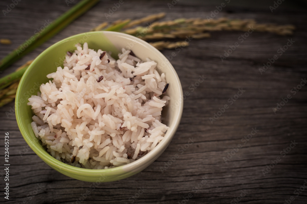 Rice on wooden background
