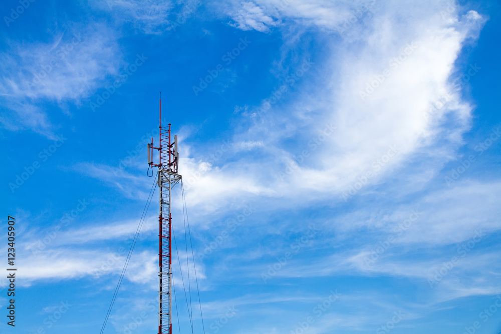 Telecommunication tower on blue sky and clouds background Telecommunication tower on blue sky and clouds background