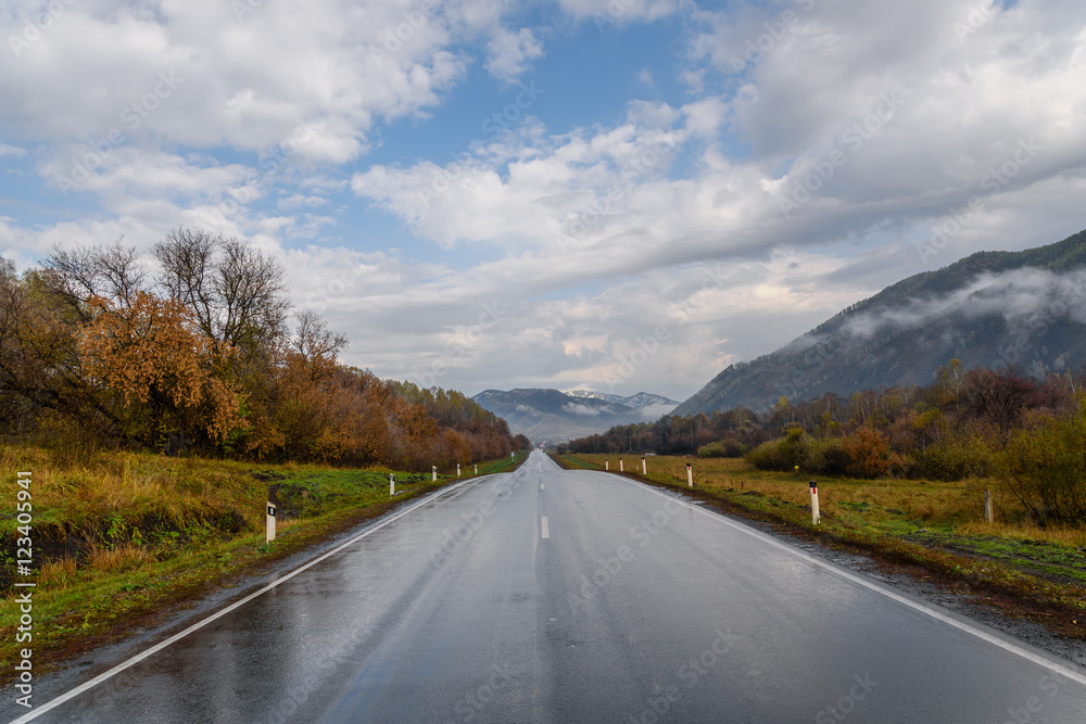 Naklejka road mountains sky asphalt autumn