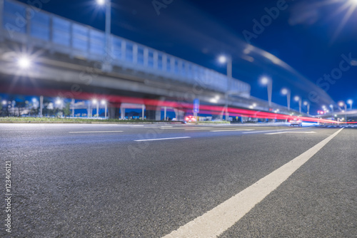 Busy highway traffic light trails at night in city of China.