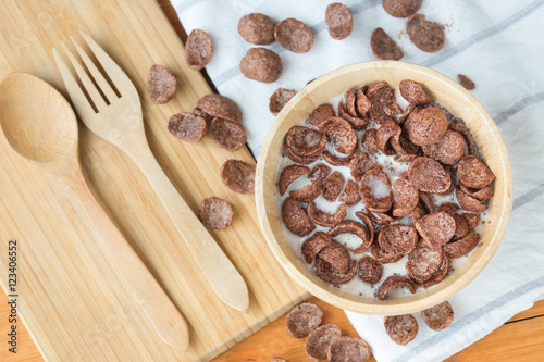 Bowl of chocolate flakes with milk for breakfast