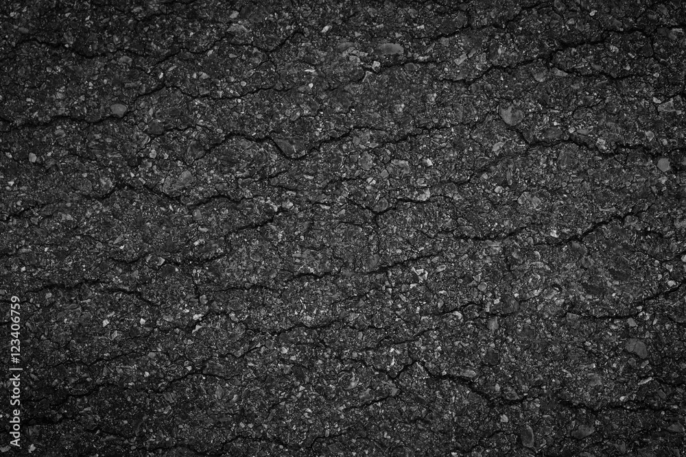 Asphalt background texture with some fine grain in it background Asphalt background texture with some fine grain in it background